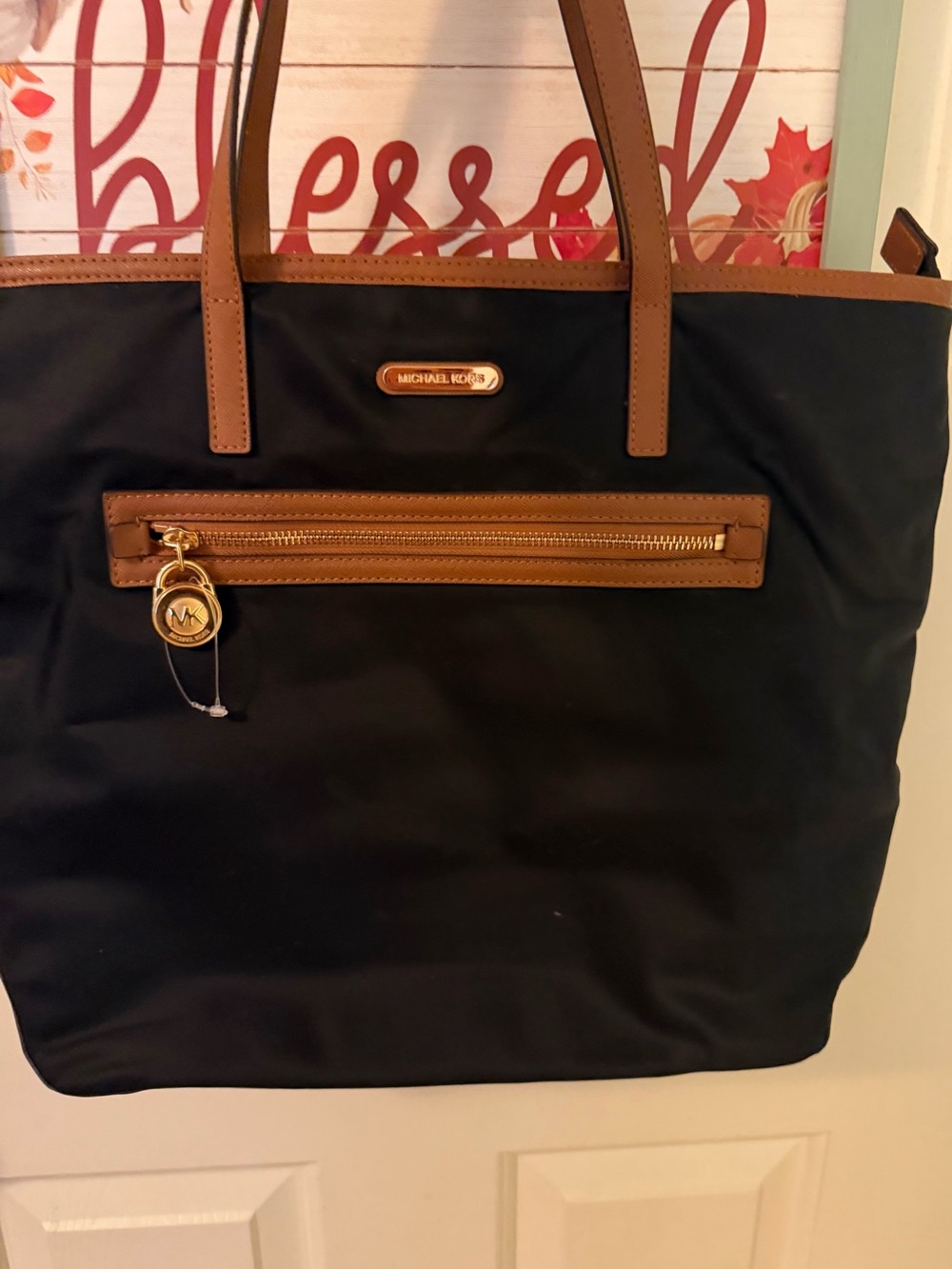 Michael Kors Black Tote with Brown Leather Trim and Gold Hardware